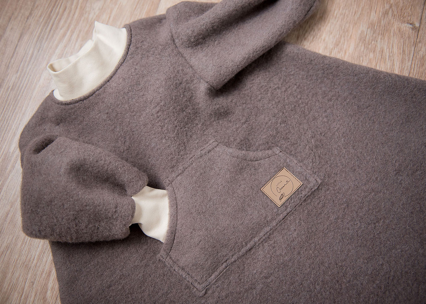 Ärmeldecke aus Merino